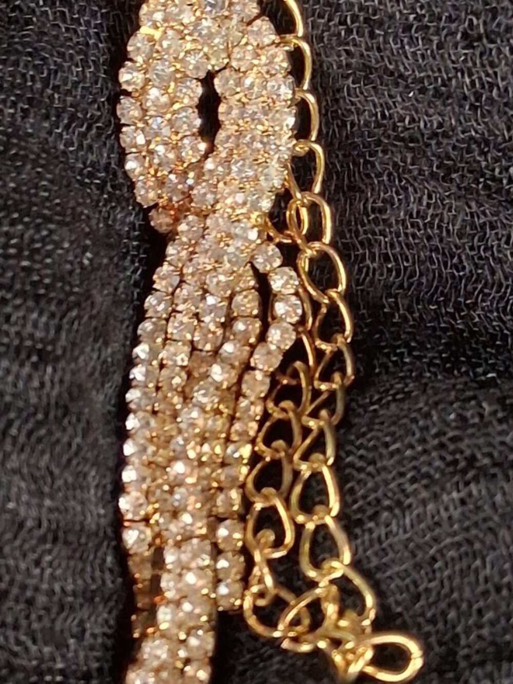 Gold-Tone Rhinestone Tassel Infinity Knot Necklace - Picture 11 of 11